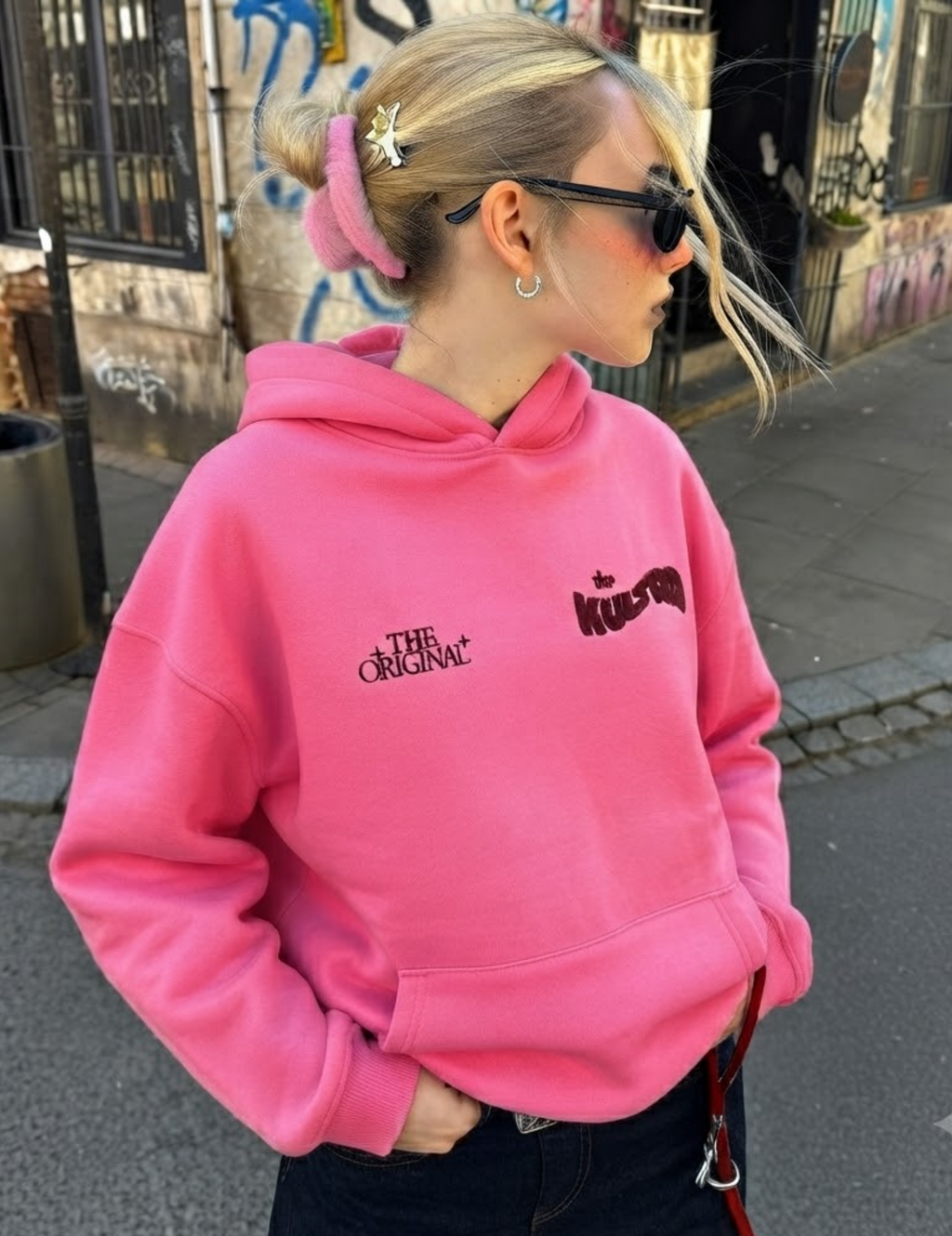THE KULTRD: Women’s relaxed Original Pink hoodie design.
